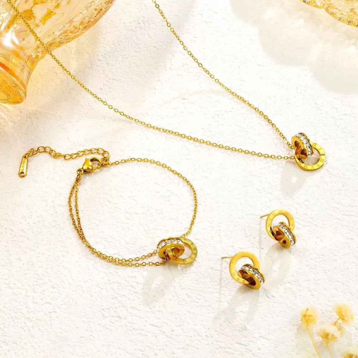 Roman Numeral Interlocking Ring Jewellery Set – Necklace, Bracelet and Earrings