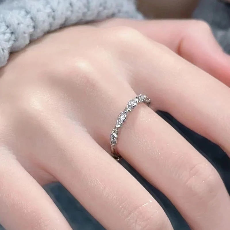 Adjustable Love Ring – Silver-Tone Twisted Band with Stone Detail